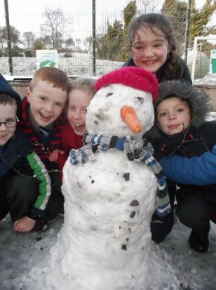 P.4 making their first snowman of the year 